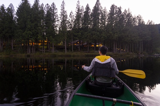 person paddling on the lake